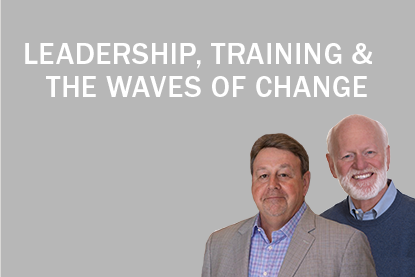 Sam Shriver and Marshall Goldsmith against gray backdrop; Leadership, Training and the Waves of Change