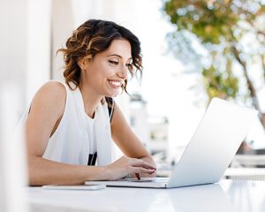 business woman enjoying virtual training via MyCLS
