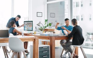 team of businesspeople working together in a modern office