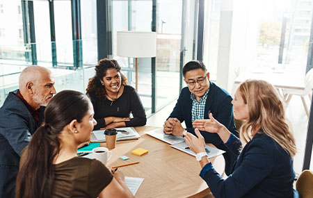 Shot of a group of businesspeople having a meeting in an office