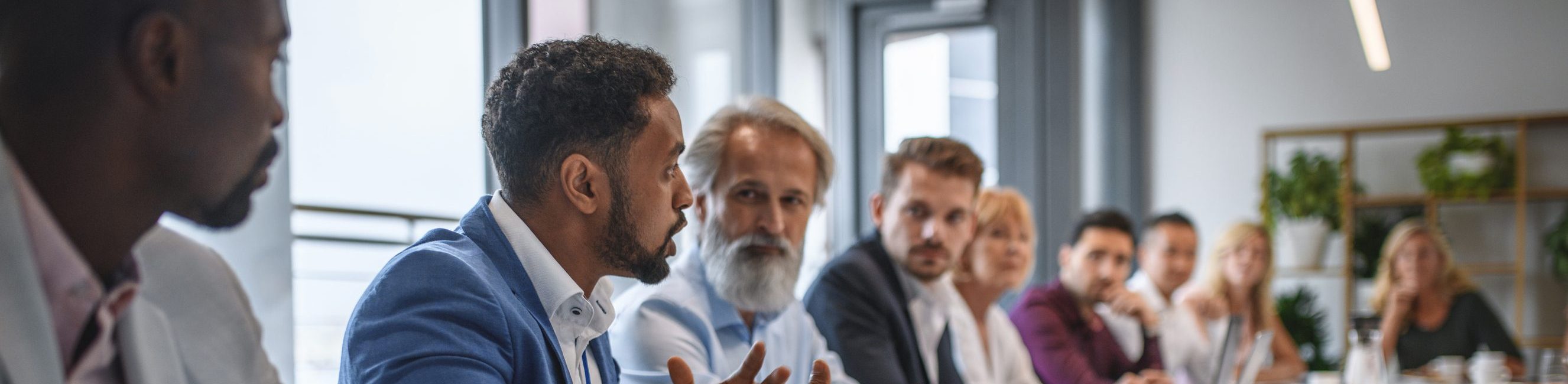 executive-team-listening-to-contrary-views-from-colleague