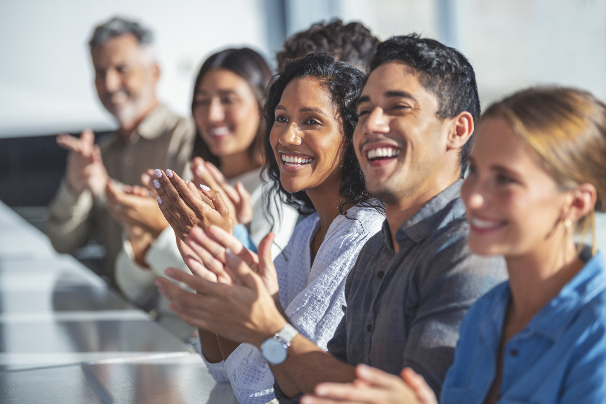 group-of-business-people-applauding-a-presentation