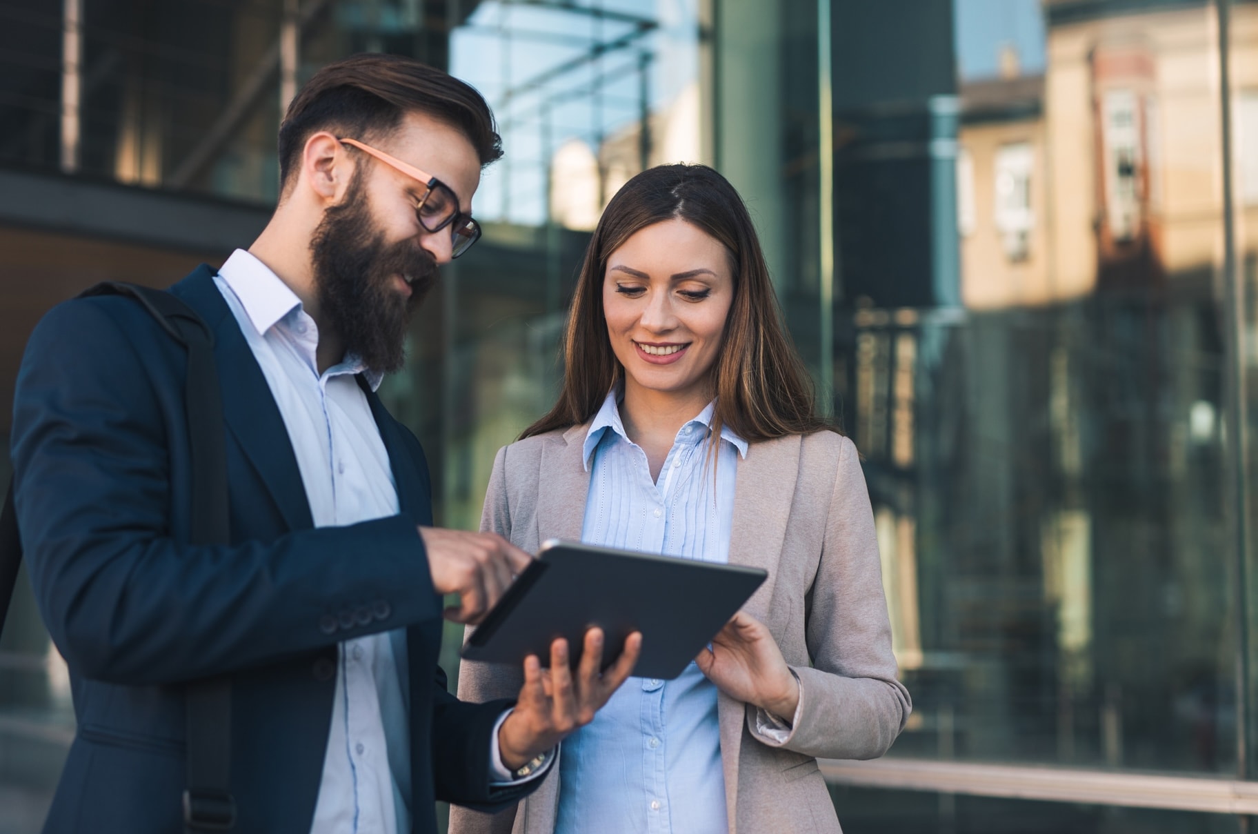 Businessman-Businesswoman-Digital-Tablet-Outdoors