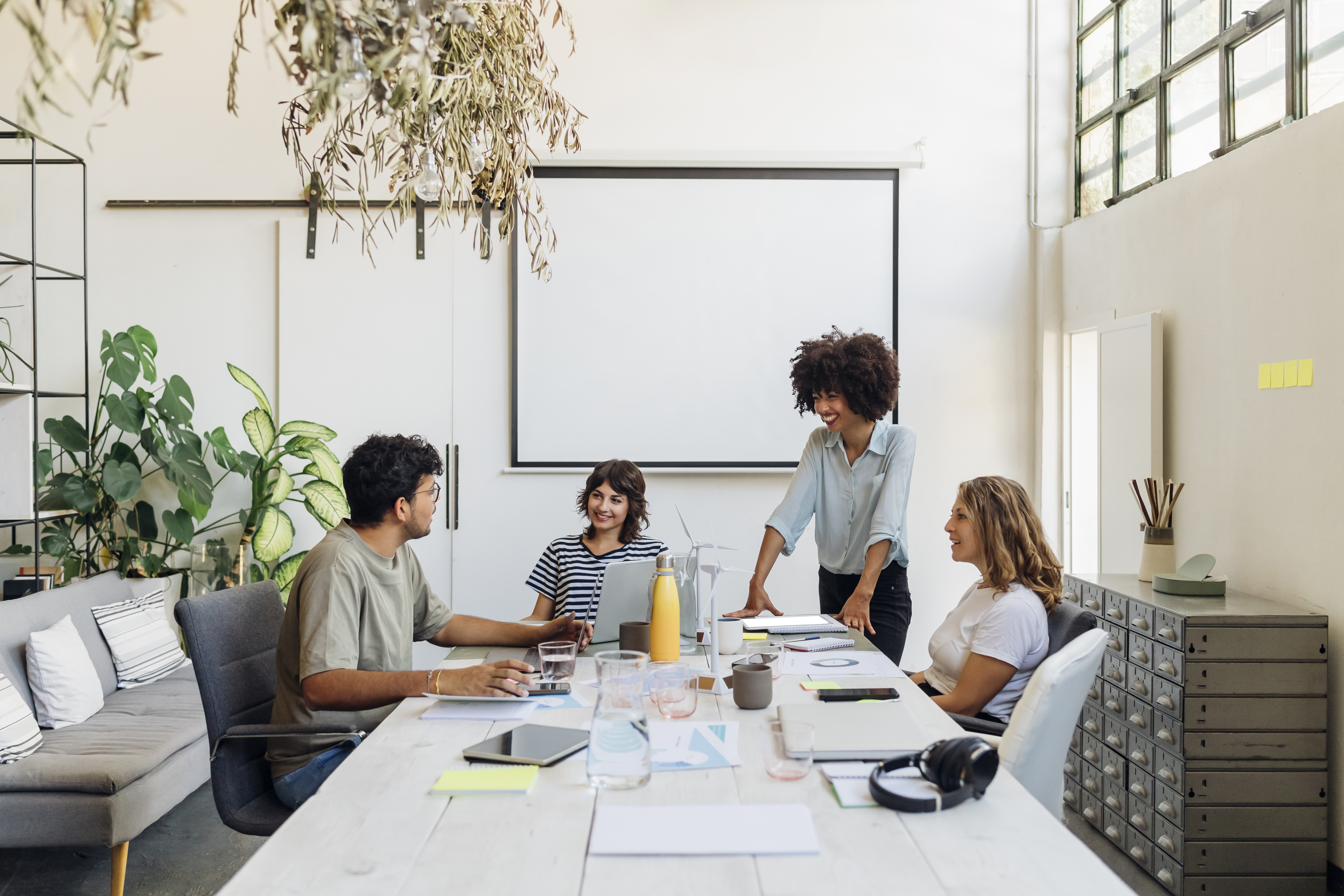 businessman-discussing-with-colleagues-in-meeting-at-office
